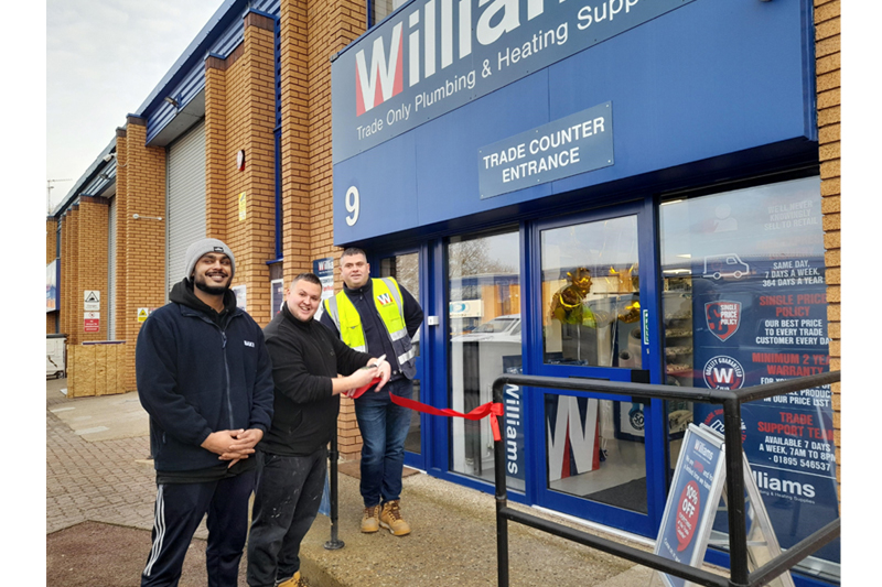 Williams West Drayton Trade Counter’s first customer – Chris Cox from Applied Heating Solutions Ltd cuts the opening ribbon.