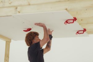 A new British-designed tool has been launched to make fitting plasterboard ceilings “easier, quicker and less physically demanding for both trade professionals and DIY users.”
